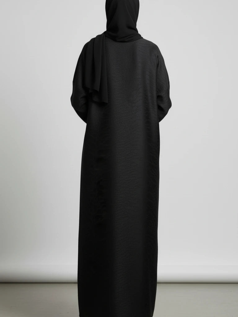 Luxury black open abaya handcrafted in Dubai with matching scarf – elegant one-piece modest wear made from premium fabric