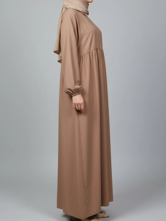 Elegant brown closed abaya with long modest cut and premium fabric, ideal as an Eid abaya or everyday abaya dress. Shop this nice abaya online in Sweden, Norway, and Denmark.