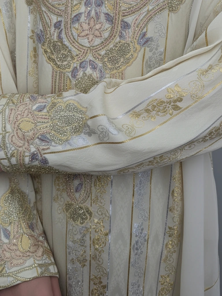 Close up of luxury embroidery of jawhara mukhawar silk dress