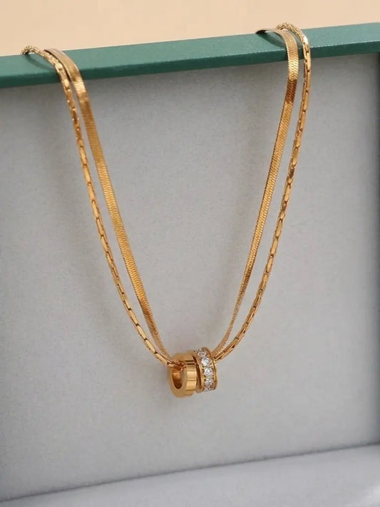 Lyxigt guldpläterat smycke i rostfritt stål med dubbelring zirkonia hänge