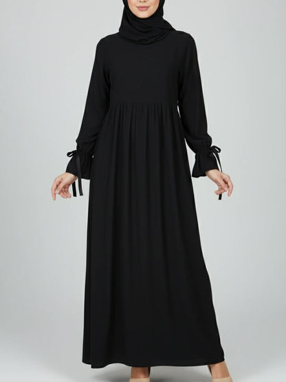 Svart lång one-piece abaya-klänning med matchande sjal – perfekt som Ramadan abaya eller öppen abaya. Handla snygga abayas online i Sverige, Norge, Danmark och Kanada.