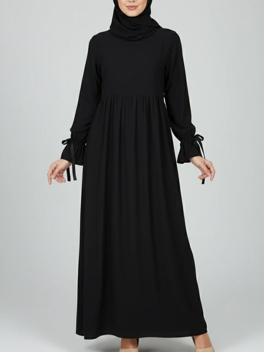 Svart lång one-piece abaya-klänning med matchande sjal – perfekt som Ramadan abaya eller öppen abaya. Handla snygga abayas online i Sverige, Norge, Danmark och Kanada.