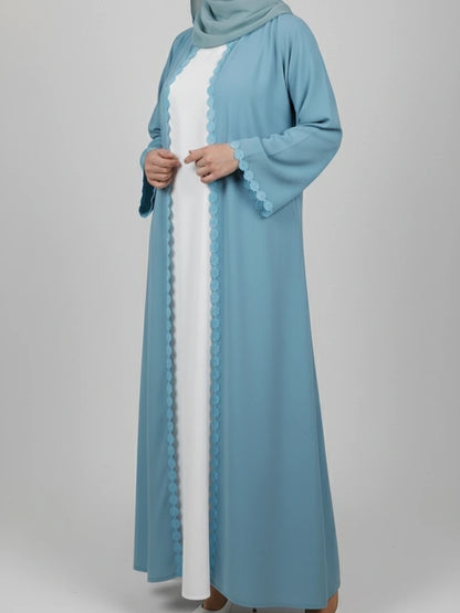 Stylish blue floral open abaya set featuring a matching scarf, ideal as an Eid abaya or casual abaya dress. Discover this nice abaya online, available for delivery in Sweden, Norway, Denmark, and Canada.