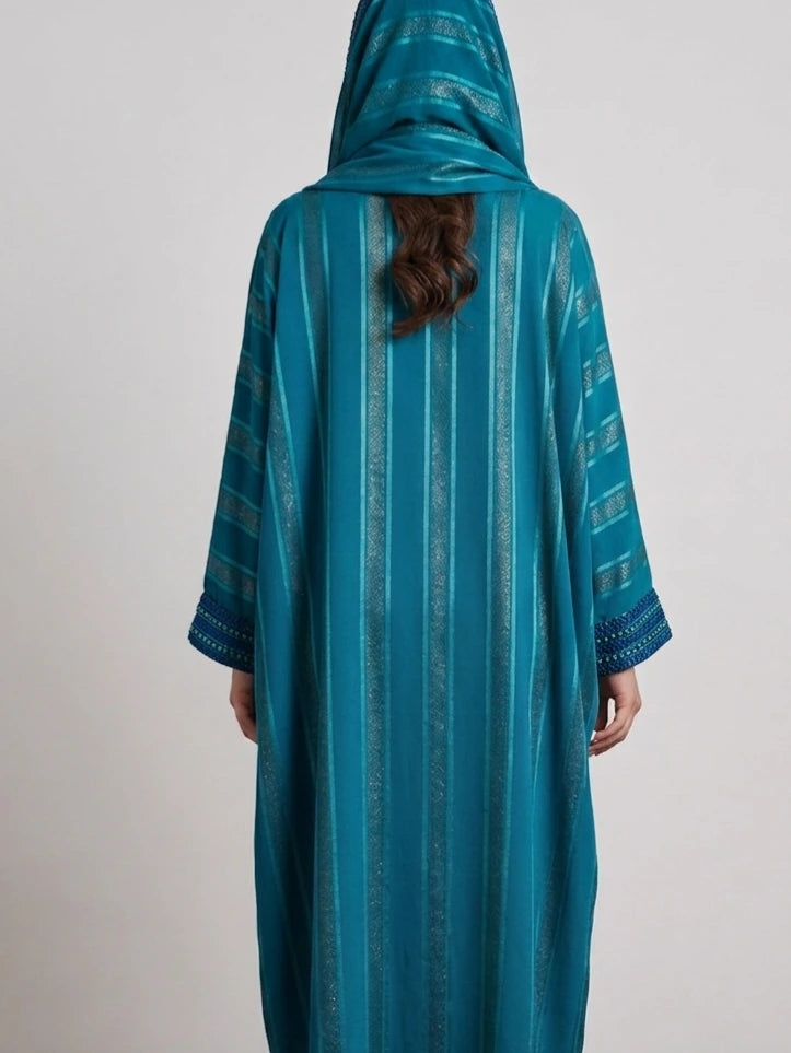 Luxury Moroccan kaftan and jellaba featuring embroidered sleeves and flowing butterfly design