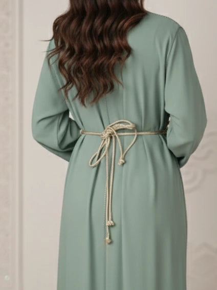 Traditional Moroccan embroidered kaftan in soft premium fabric, styled with belt for a flattering fit