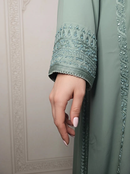 Elegant Moroccan long kaftan with embroidered details and matching belt – handmade in Morocco