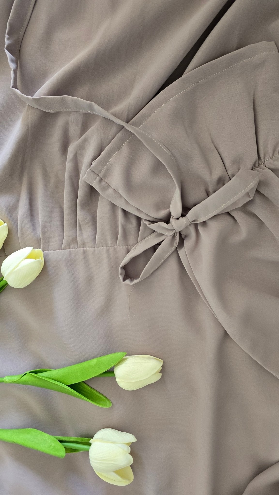 Elegant Muslimah dress in beige abaya style with modern silhouette