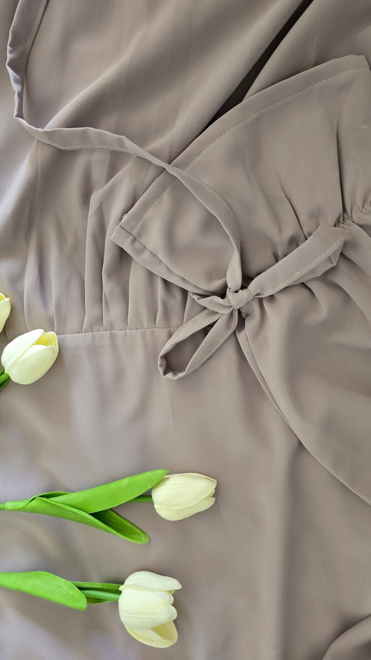 Elegant Muslimah dress in beige abaya style with modern silhouette