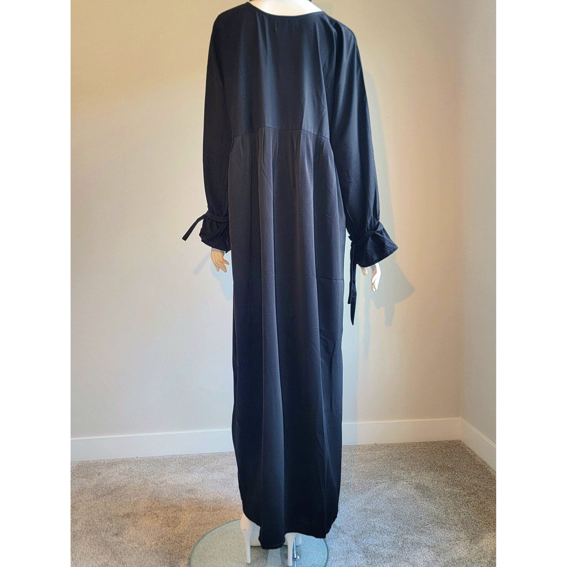 Svart abaya med hijab