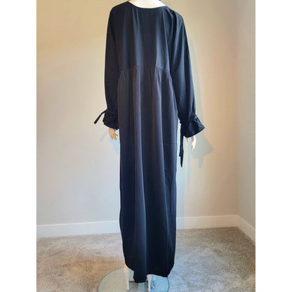 Svart abaya med hijab
