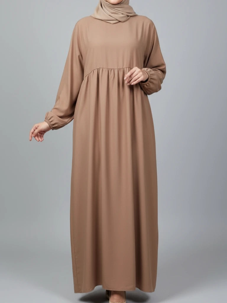 Premium brown closed abaya dress made from Dubai fabric with a loose-fit modest design — perfect Eid abaya, Ramadan abaya and one of our nicest abayas available online in Sweden, Norway, and Denmark.
