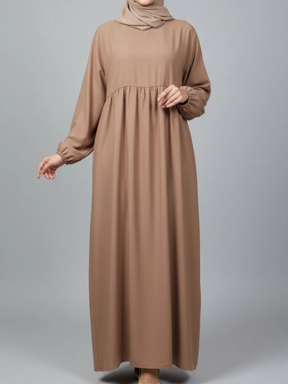 Premium brown closed abaya dress made from Dubai fabric with a loose-fit modest design — perfect Eid abaya, Ramadan abaya and one of our nicest abayas available online in Sweden, Norway, and Denmark.