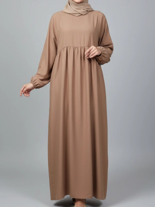 Premium brown closed abaya dress made from Dubai fabric with a loose-fit modest design — perfect Eid abaya, Ramadan abaya and one of our nicest abayas available online in Sweden, Norway, and Denmark.