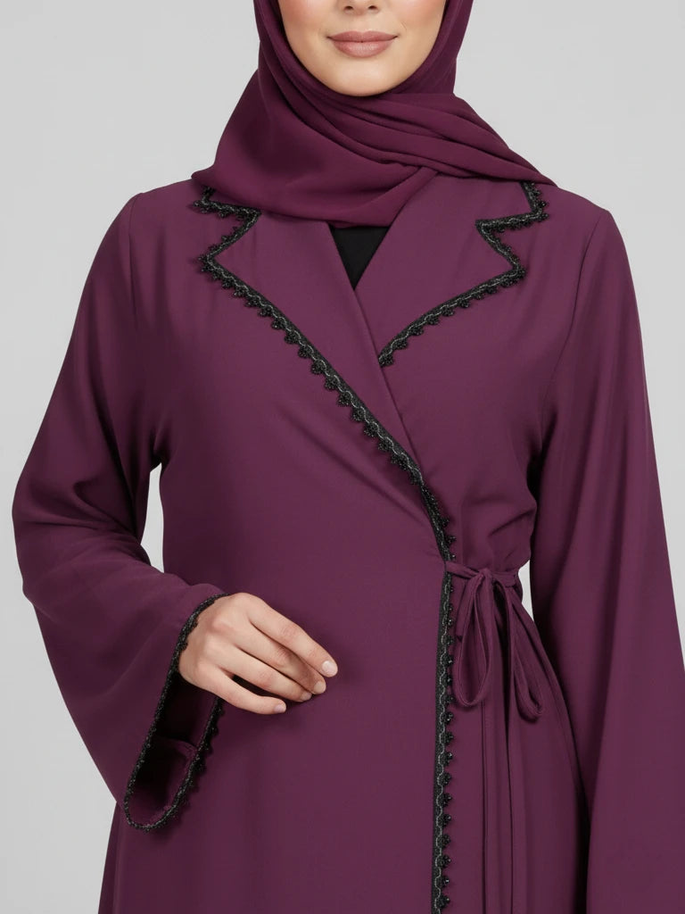 Luxury open long abaya with blazer-style collar, embroidered stone detailing, side ribbon closure, and matching hijab, handmade in Dubai