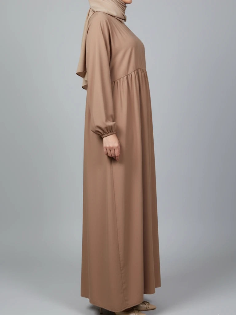 Elegant brown closed abaya with long modest cut and premium fabric, ideal as an Eid abaya or everyday abaya dress. Shop this nice abaya online in Sweden, Norway, and Denmark.