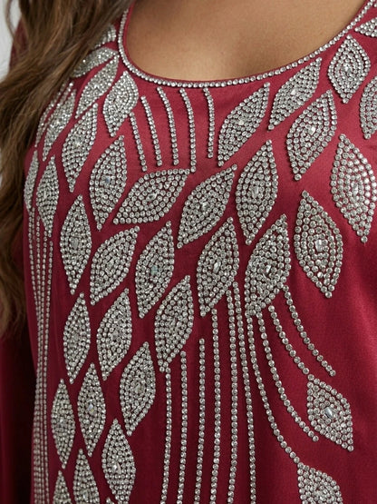 Flödande lång kaftan med smickrande bälte bak, perfekt för Eid och Ramadan