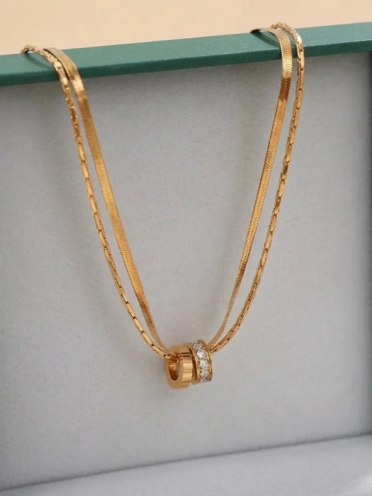 Lyxigt guldpläterat smycke i rostfritt stål med dubbelring zirkonia hänge