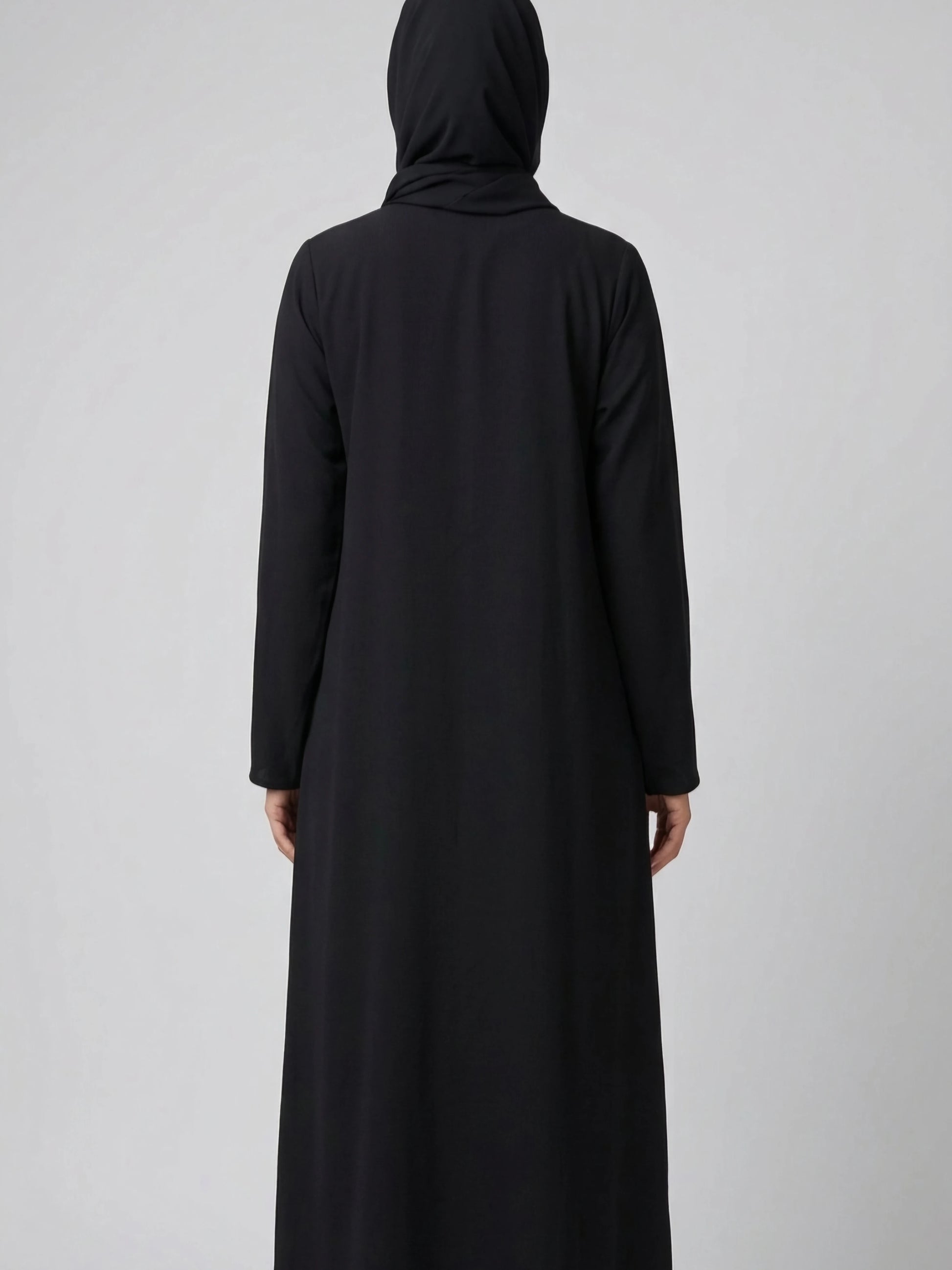 Svart Dubai-abaya i premium crêpe med stenbroderi framtill