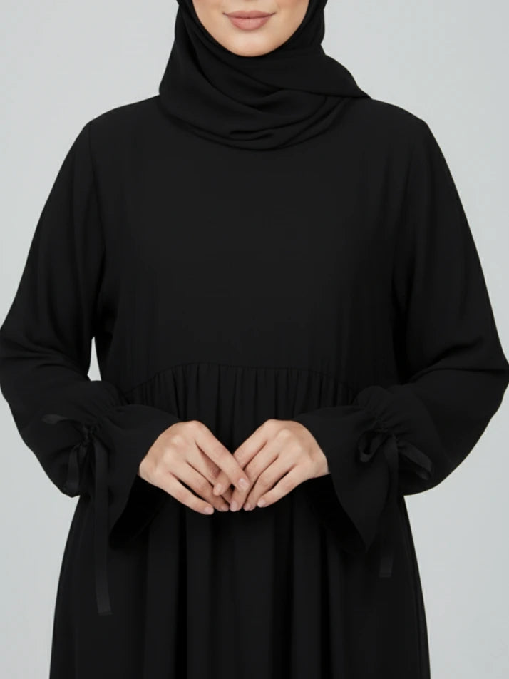 Black one-piece long abaya dress with matching scarf — elegant closeabaya style and perfect as an ramadan abaya. Shop nice abayas and abaya online in Sweden, Norway, Denmark, and Canada 