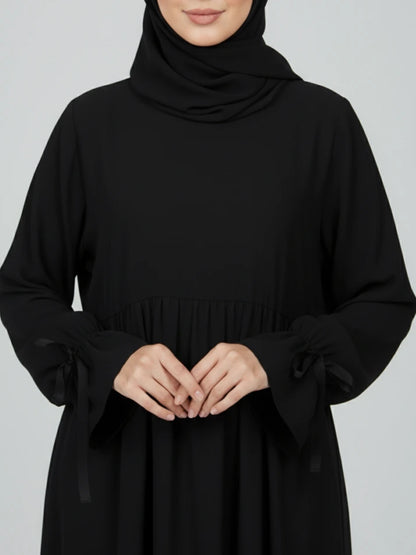 Black one-piece long abaya dress with matching scarf — elegant closeabaya style and perfect as an ramadan abaya. Shop nice abayas and abaya online in Sweden, Norway, Denmark, and Canada 